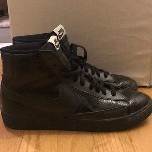 Rare women’s Nike snakeskin mid high tops